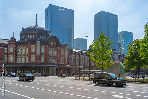 View of Tokyo Station and Chiyoda's Marunouchi business district backdrop on a sunny day, Chiyoda, Tokyo, Honshu, Japan