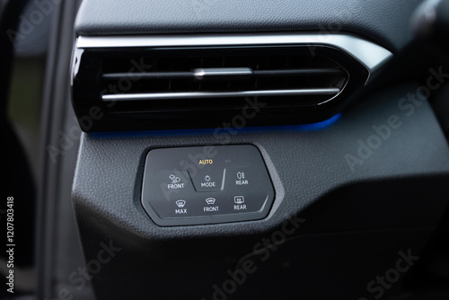 Headlight switch, on off mode lights, automatic control of switching on and off the car light. Mode of lamp electric car. Lights switch cars, car interior. Modern LED Car IQ Headlights. photo