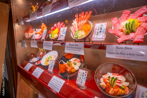 View of colourful frontage of restaurant in Omicho Market, Kanazawa City, Ishikawa Prefecture, Honshu, Japan photo