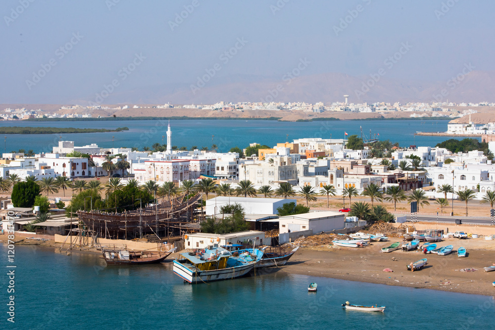 Dhows in shipyard, Sur Township, port-city, capital of Ash Sharqiyah Region, Sultanate of Oman, Arabian Peninsula Dhows in shipyard, Sur Township, port-city, capital of Ash Sharqiyah Region, Sultanate of Oman, Arabian Peninsula