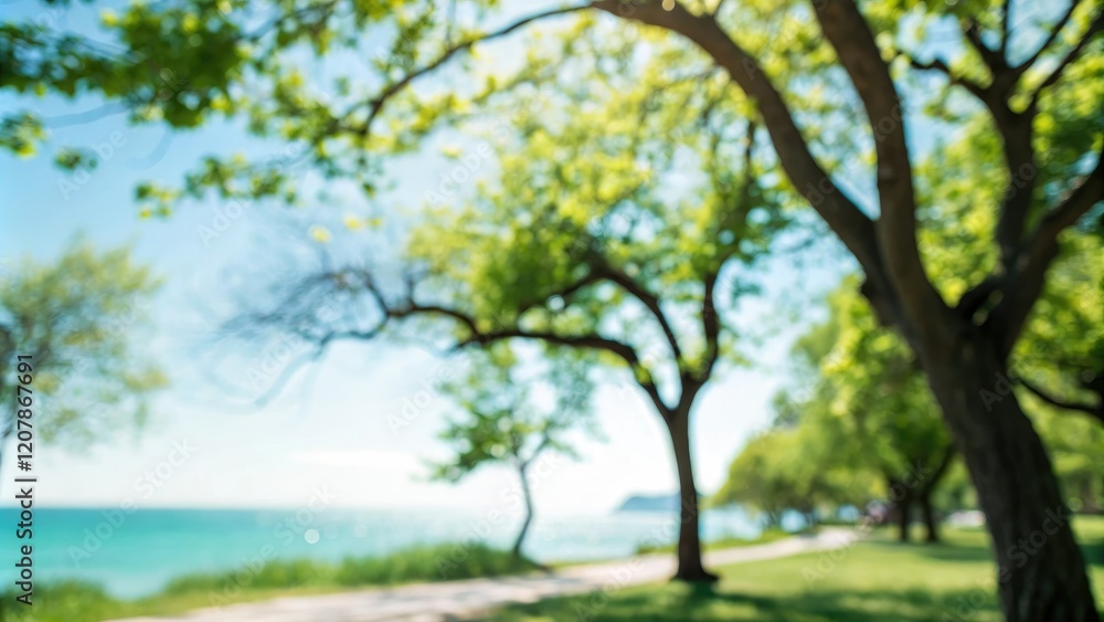 Obraz premium Blurred image of a sunny day with multiple tree branches set against a greenish-blue background, blue hues, landscape
