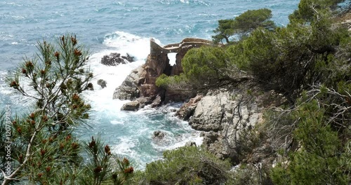 Wallpaper Mural Camino del Castillo de Plaja – Natural Archway Along the Costa Brava Coastline Torontodigital.ca