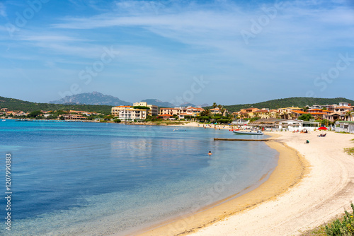 Fototapeta Naklejka Na Ścianę i Meble -  Golfo Aranci beach with hotels and turquoise water in Sardinia, Italy