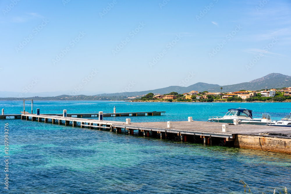 Obraz premium Boat in Golfo Aranci marina in the coast of Sardinia, Italy