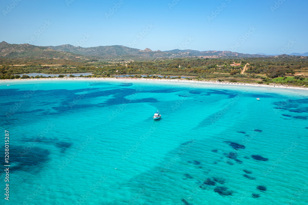Fototapeta premium Drone aerial view of Brandinchi beach with white sand and turquoise water in Sardinia, Italy