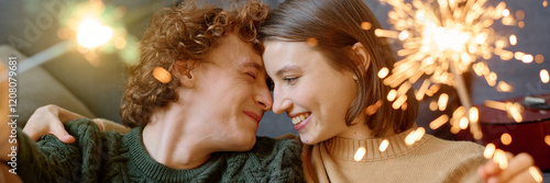 Billede på lærred Website banner with adorable and lovely couple cuddling while holding lit Bengal