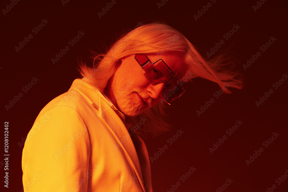 Stylish portrait of a man with long white hair wearing oversized sunglasses in a dramatic orange background, capturing a sense of sophistication and bold fashion Stylish portrait of a man with long white hair wearing oversized sunglasses in a dramatic orange background, capturing a sense of sophistication and bold fashion