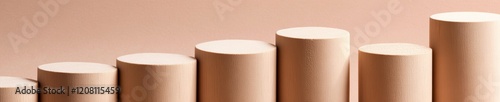 Minimalist Beige Wood Cylinders as Strategic Growth Metaphor - Business Innovation in Product Design and Visual Branding for Modern Marketing photo