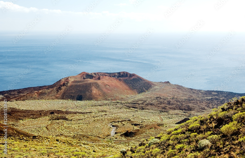 El Hierro, Canary Islands, Spain. Geology. Volcano cone above the Faro de Orchilla on the west coast.