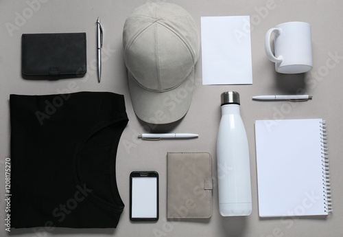 Different blank items for branding on grey background, flat lay. Mockup for design