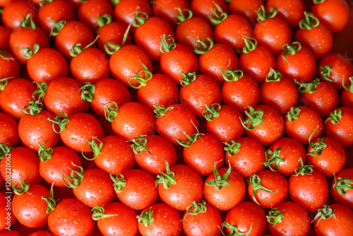 ripe juicy red tomatoes with leaves