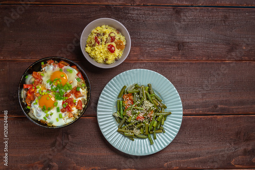 Jewish food tzimmes, chelnt, shakshuka for the holiday. Horizontal photo