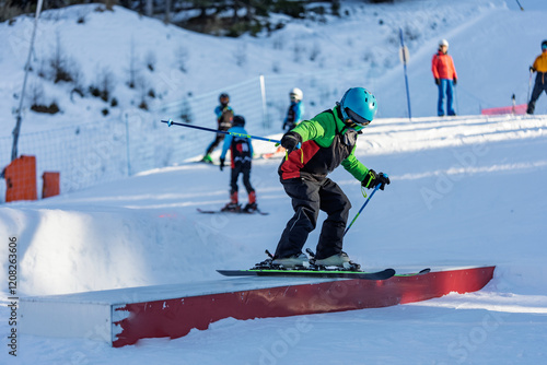 Obraz na plátně Children skiers in snowpark in Dolomites Alps