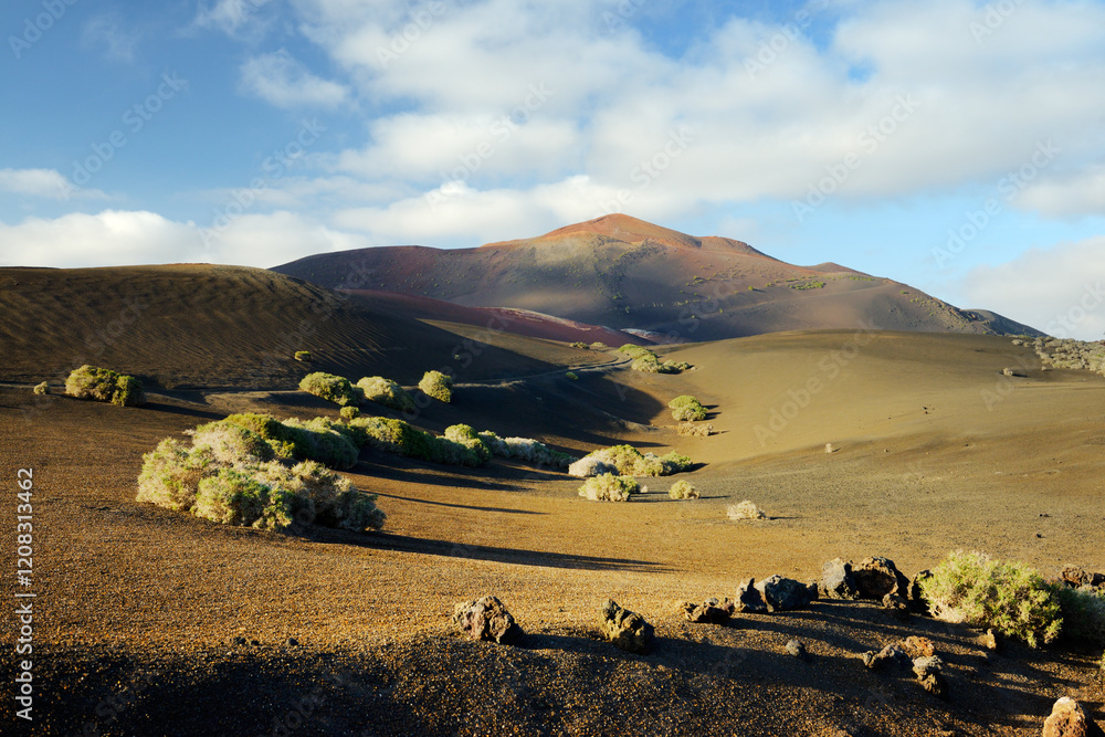 Volcano cones and lava cinder fields of Timanfaya National Park, Lanzarote, Canary Islands. North from LZ-67 Lava Road near Uga