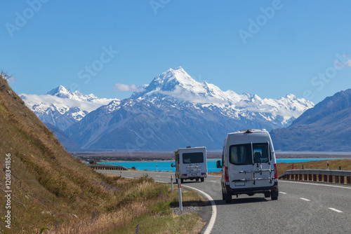 Travelling in campervan  to Mount Cook National Park over picturesque Lake Pukaki and Southern Alps, New Zealand