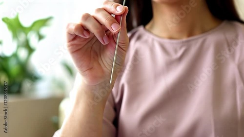 Wallpaper Mural woman lifting needle tray acupuncture session precision or holistic wellness tranquil therapy or healing serene relaxation care Torontodigital.ca