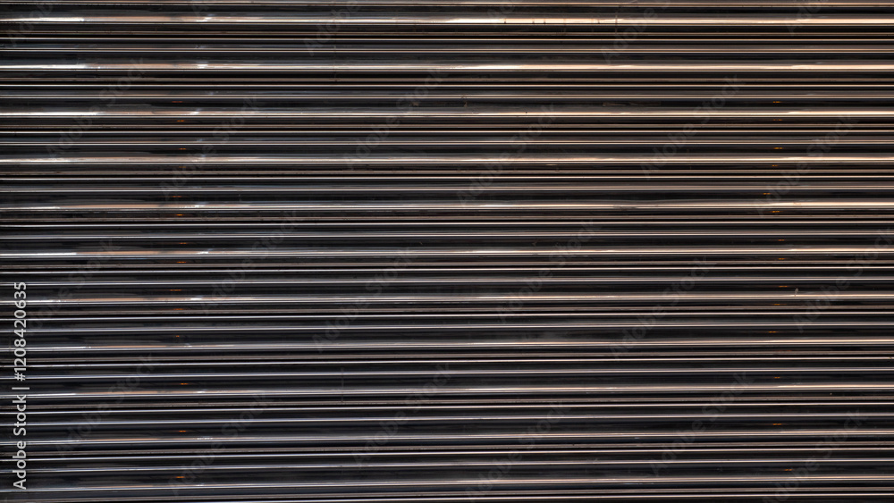 Texture of a metal shutter with lines and reflections Texture of a metal shutter with lines and reflections