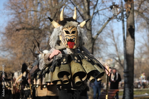 The Surva masquerade games festival in Sofia, Bulgaria. People called Kukeri parade in masks and ritual costumes, perform ritual dances to drive away evil spirits in Sofia, Bulgaria