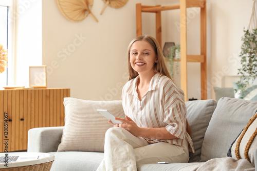 Young woman working with ta...