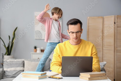 Working young man stressed ...