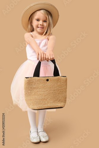 Cute little girl in hat wit...