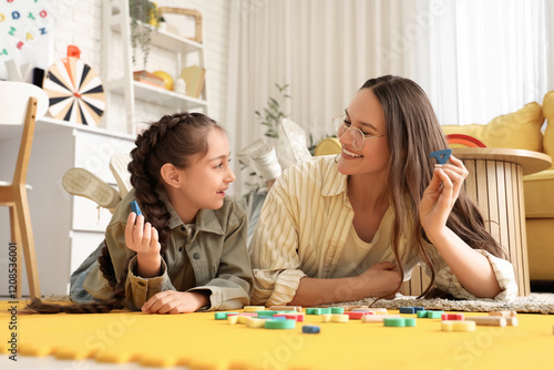 Female speech therapist and...