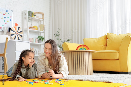 Female speech therapist and...