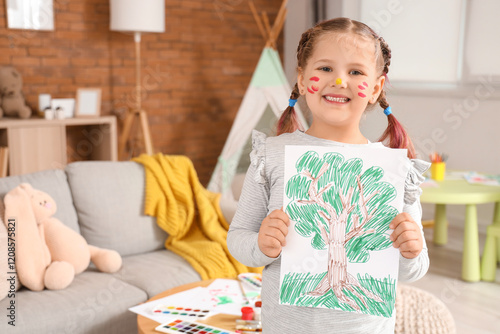 Little girl with drawn tree...
