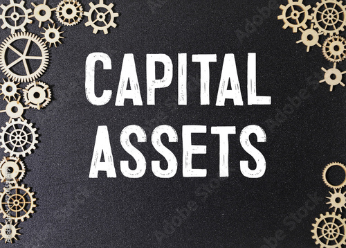 Capital gains - increase in a capital asset's value and is realized when the asset is sold photo