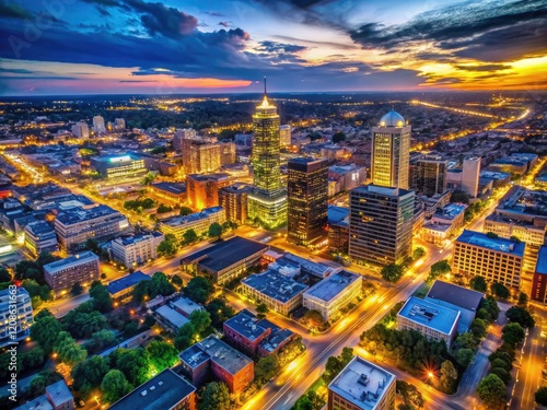 Aerial view of Lexington, Kentucky at night, showcasing its urban landscape and sparkling city lights.