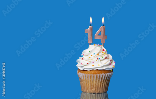 Birthday Or Anniversary Cupcake With Lit Candles; Candles Forming The Number 14.