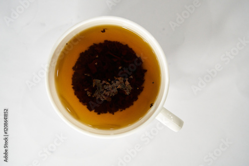 White cup of black tea