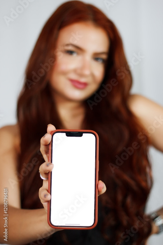woman holding a smartphone
