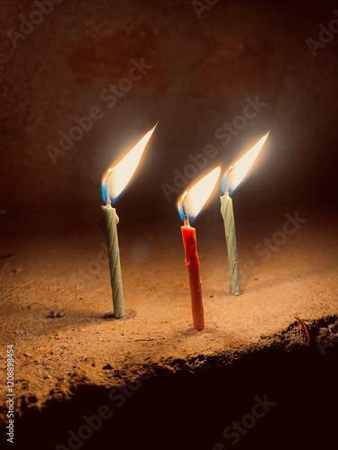 burning candle in the dark