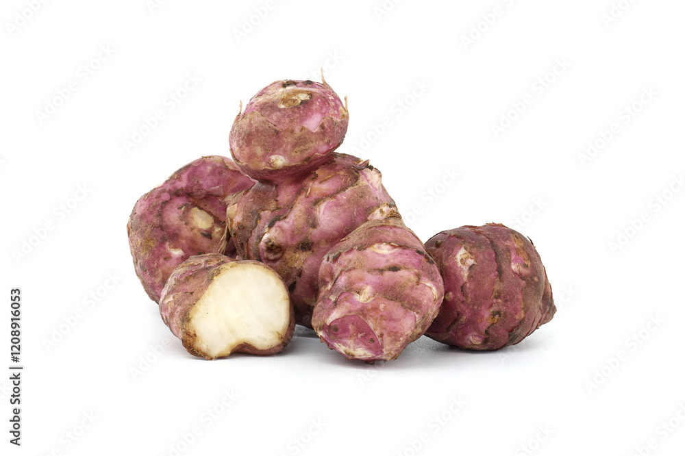 Fresh Jerusalem Artichokes Piled on a Clean White Surface Fresh Jerusalem Artichokes Piled on a Clean White Surface