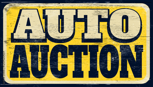 Aged and worn auto auction sign on wood