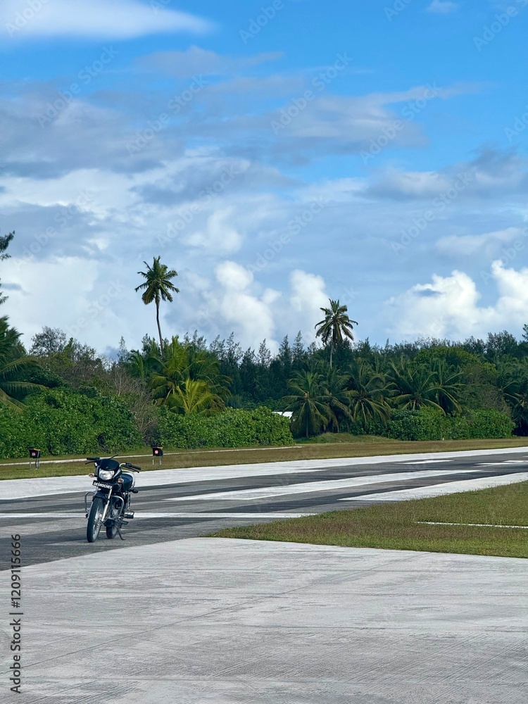 Motorbike parked on runway Motorbike parked on runway