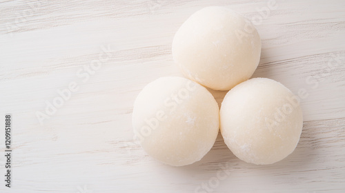 Three White Eggs on a Woode...