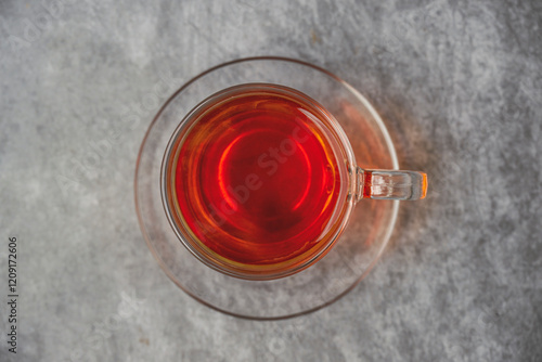 Photography Black tea in a glass cup also locally called kattan chai, Sulaimani tea, Kerala Kattan Chaya, Malabar spiced tea