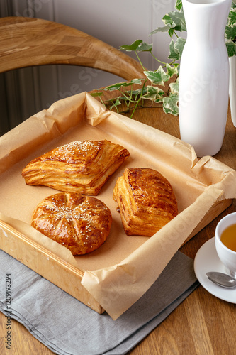 Bild auf Leinwand puff pastry buns on a tray