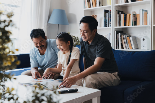 Loving LGBTQ couple and their daughter enjoy a storytime together in their cozy family living room