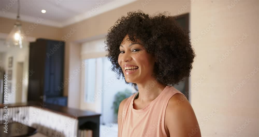 Smiling woman in casual wear standing in modern home interior, copy space Smiling woman in casual wear standing in modern home interior, copy space