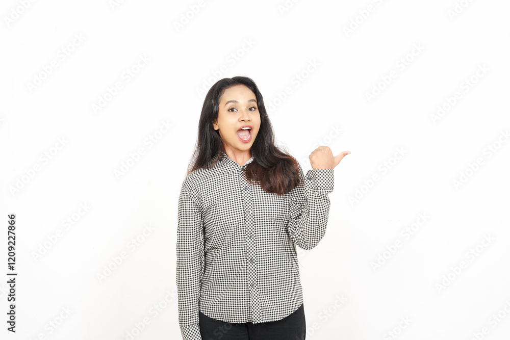 Pointing to the Side using thumb Of Beautiful Asian Woman Isolated On White Background
