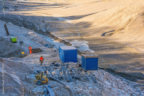 Lago di Barcis - Barcis artificial lake drained of water for routine maintenance in Friuli-Venezia Giulia, north east Italy. The reservoir was created in 1954 for hydroelectric energy production. 