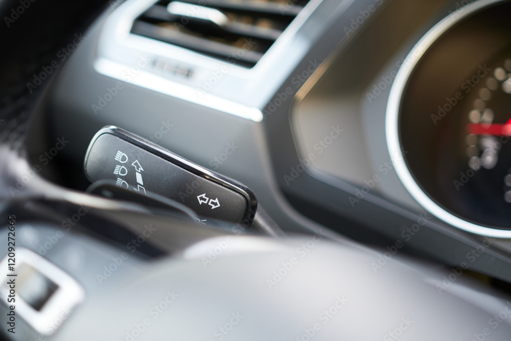 Close-up of the paddle shifter on the steering wheel. A modern car. Close-up of the paddle shifter on the steering wheel. A modern car.