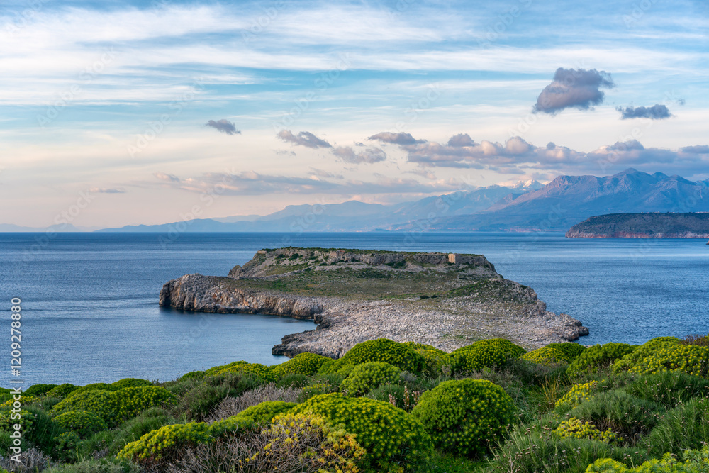 Tigani Peninsula view with mountains and sea on the background Tigani Peninsula view with mountains and sea on the background