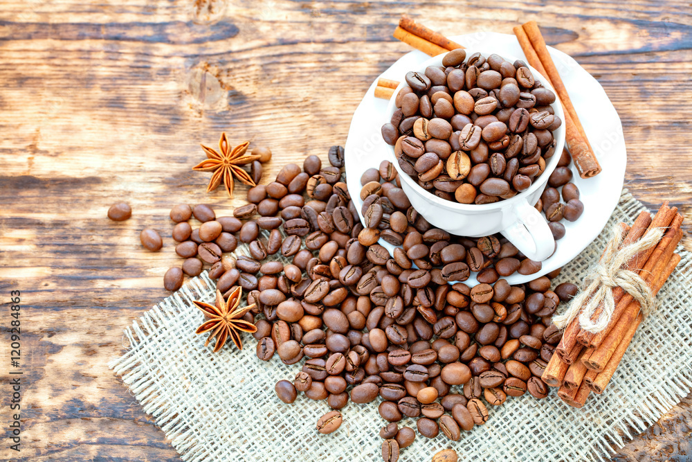 Savoring the rich aroma of coffee beans and spices on a rustic wooden table