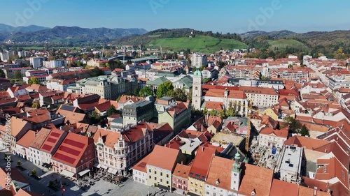Amazing panoramic video of Maribor old town with bridges and beautiful red roofed houses along Drava river in Slovenia