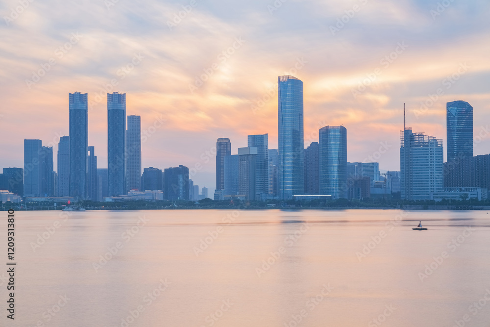 Fototapeta premium The urban skyline and Ganjiang River scenery of Nanchang City, Jiangxi Province, China on April 1, 2024
