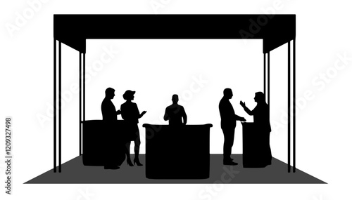 Silhouetted group of business people discussing at trade show booth